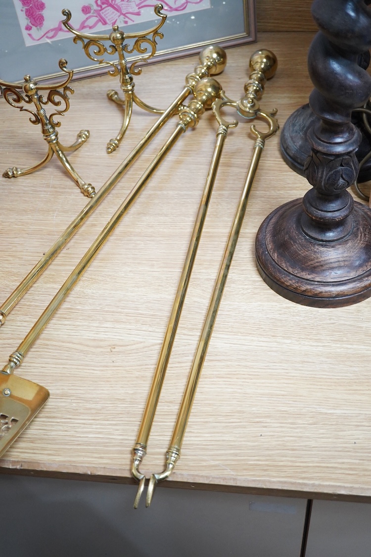 Three brass andirons and two trivets